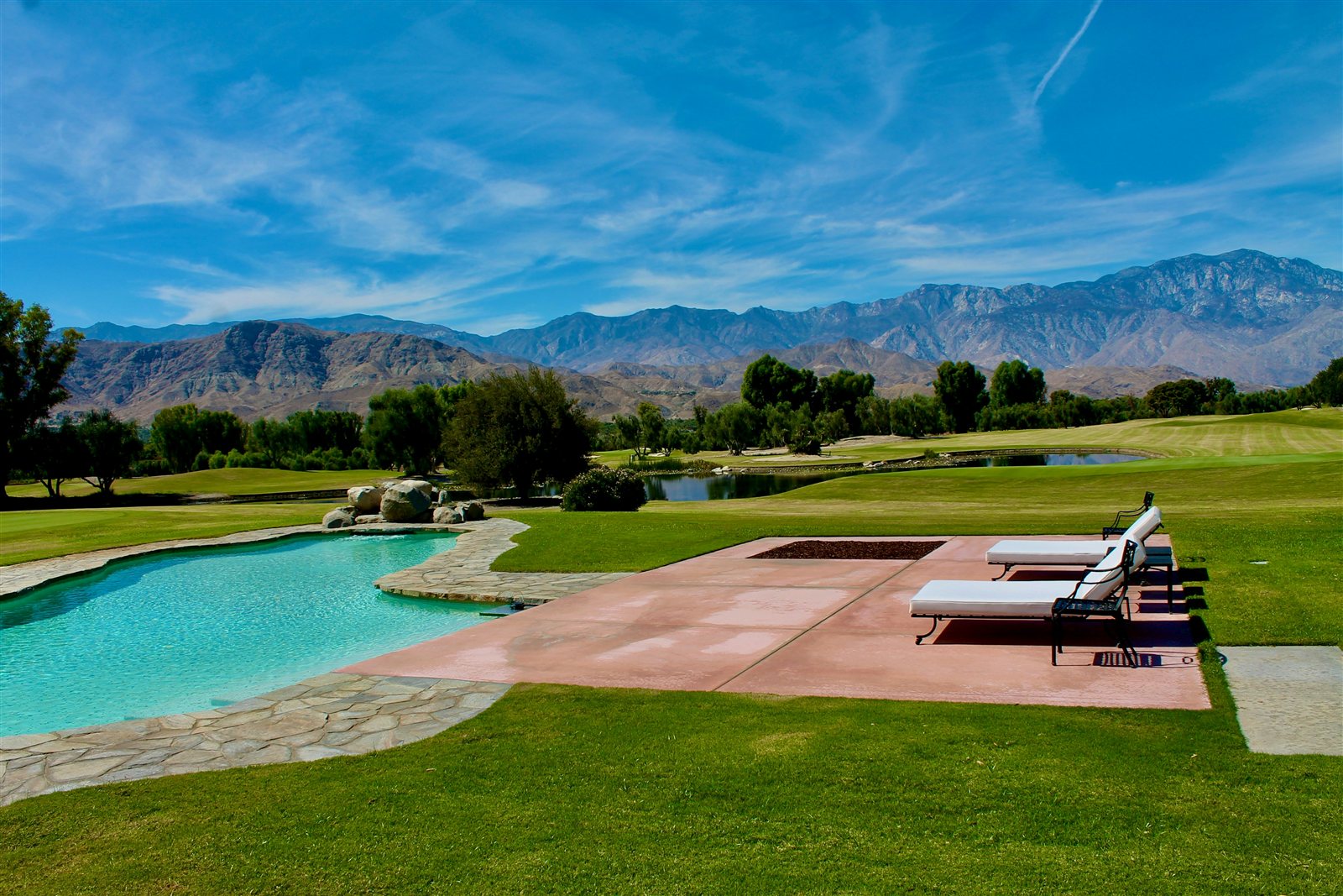Luxury pool and golf course with Santa Rosa Mountains, Rancho Mirage, California